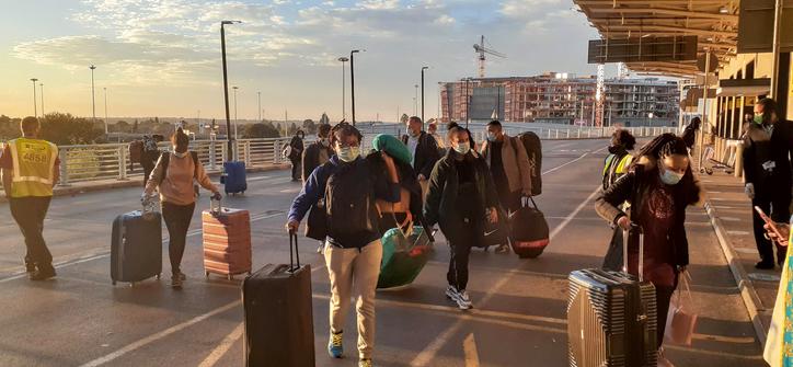 Scholarship holders and their baggage at OR Tambo